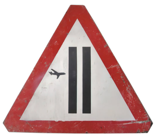 Banksy and Andy Warhol: The Unlikely Dialogue Between Street Art and Pop Art Royalty - WARNING SIGN 2006 by Banksy